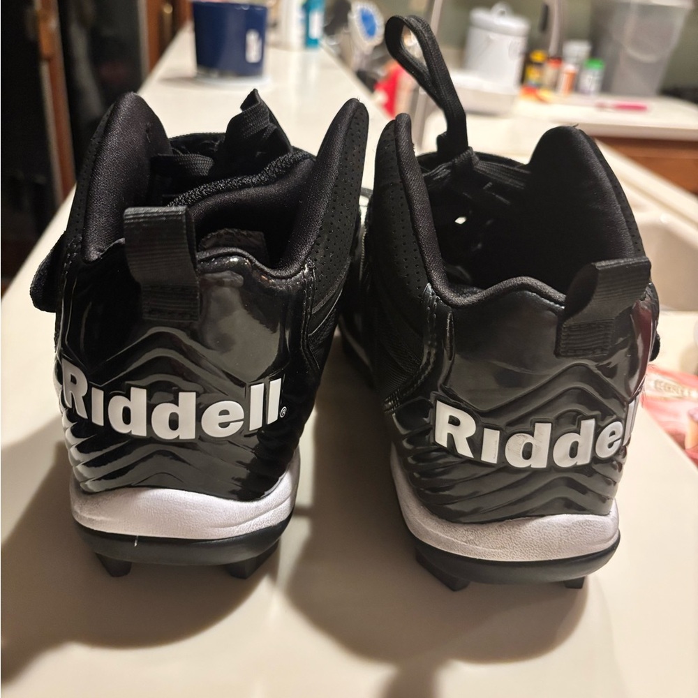 Men’s football cleats- worn 3 times, then my son broke his arm